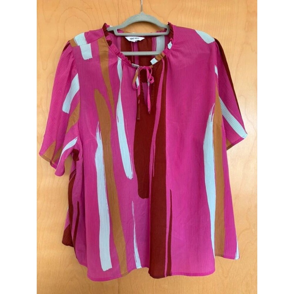 Pink flowy blouse